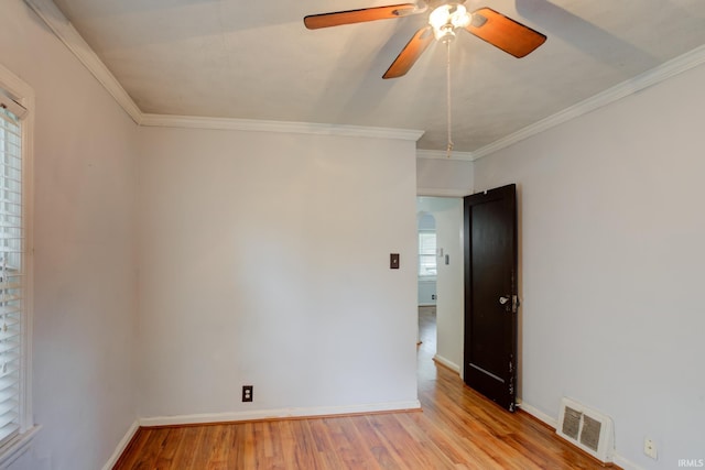 1521 Monroe Ave, Evansville, IN 47714 - unfurnished room with a ceiling fan, wood finished floors, ornamental molding, and baseboards