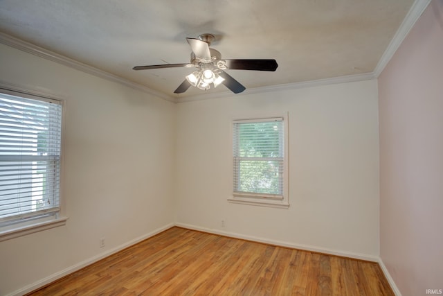 1521 Monroe Ave, Evansville, IN 47714 - spare room featuring healthy amount of natural light, light wood finished floors, and ornamental molding