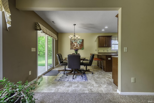 229 Ironwood Ln, Ossian, IN 46777 - dining space featuring baseboards, a chandelier, and recessed lighting