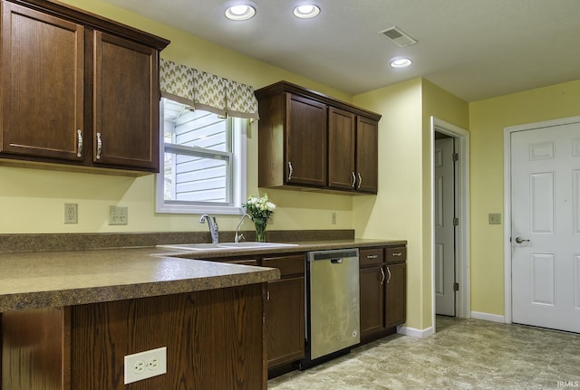 229 Ironwood Ln, Ossian, IN 46777 - kitchen with stainless steel dishwasher, a sink, dark countertops, dark brown cabinetry, and baseboards