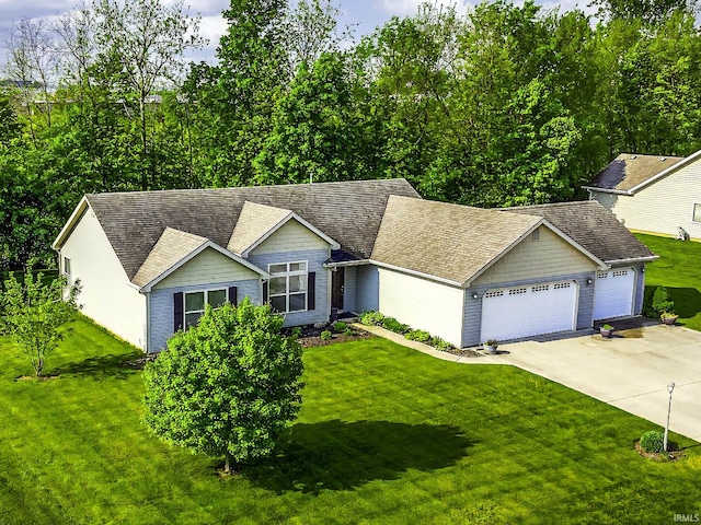 229 Ironwood Ln, Ossian, IN 46777 - single story home featuring a garage, driveway, and a front lawn