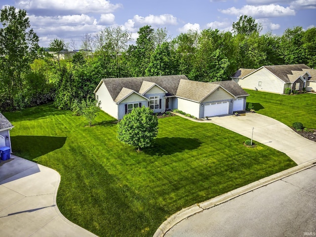229 Ironwood Ln, Ossian, IN 46777 - view of front of property with driveway, an attached garage, and a front lawn