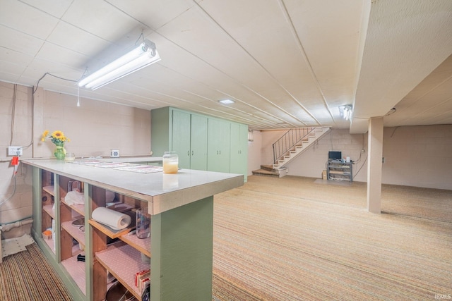 902 Hawthorne Ln, Logansport, IN 46947 - kitchen featuring open shelves, green cabinetry, carpet floors, and light countertops
