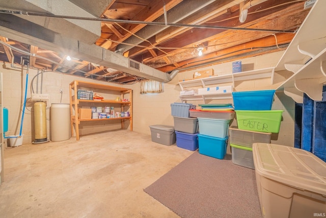 902 Hawthorne Ln, Logansport, IN 46947 - unfinished basement featuring a water softener system