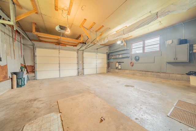 902 Hawthorne Ln, Logansport, IN 46947 - garage featuring a garage door opener