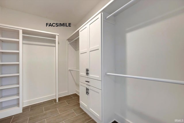 910 S Lantern Ln, Ellettsville, IN 47429 - walk in closet featuring wood finish floors