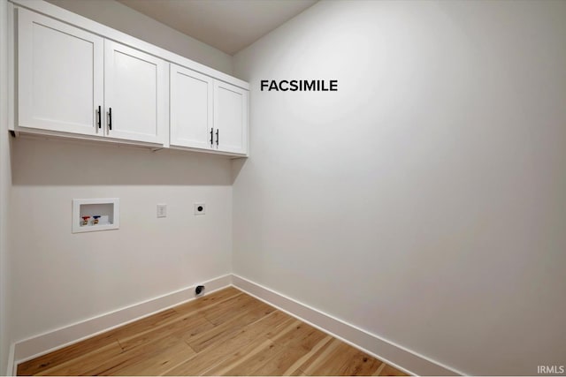 910 S Lantern Ln, Ellettsville, IN 47429 - laundry area featuring cabinet space, baseboards, electric dryer hookup, light wood finished floors, and hookup for a washing machine