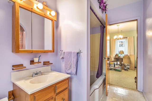 222 Queen St, Goshen, IN 46528 - full bath with vanity, a chandelier, and shower / bath combo with shower curtain