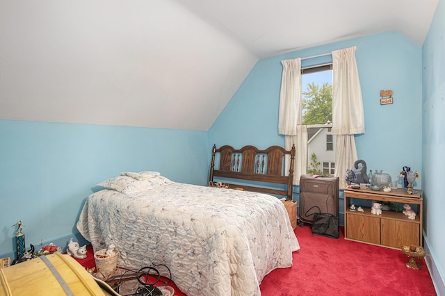222 Queen St, Goshen, IN 46528 - bedroom with lofted ceiling and carpet flooring