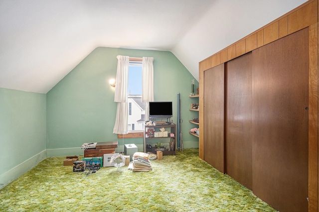 222 Queen St, Goshen, IN 46528 - bonus room with carpet floors, vaulted ceiling, and baseboards
