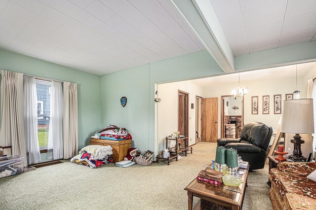 222 Queen St, Goshen, IN 46528 - carpeted living area featuring a chandelier