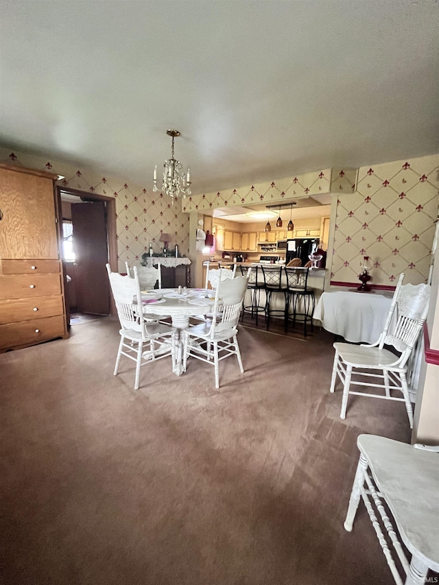 12537 E 340 S, Greentown, IN 46936 - dining area with wallpapered walls, a chandelier, and carpet