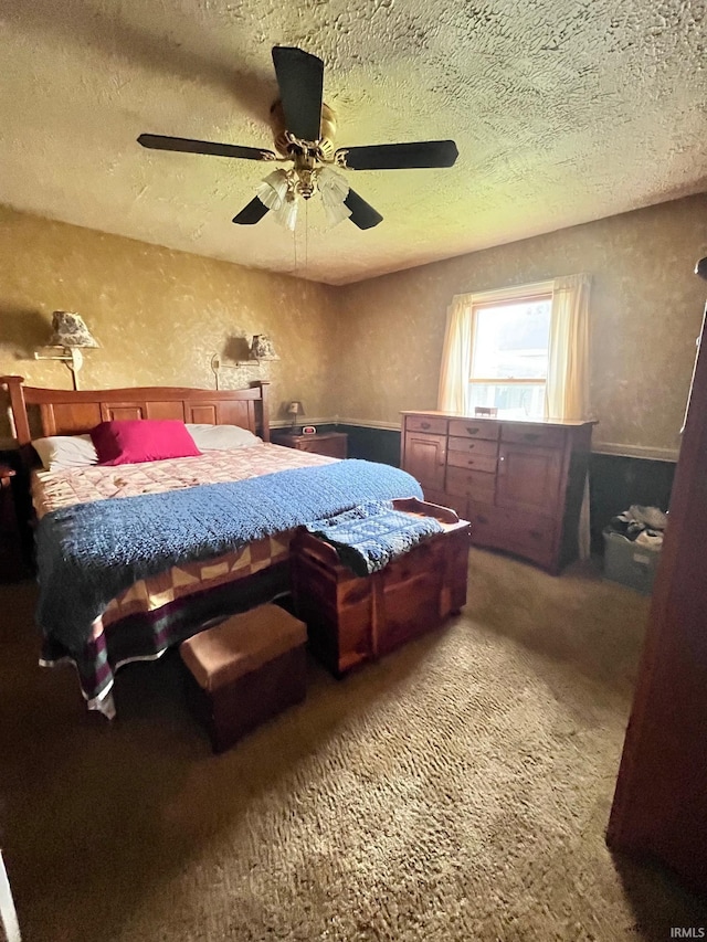 12537 E 340 S, Greentown, IN 46936 - carpeted bedroom with a textured ceiling and ceiling fan
