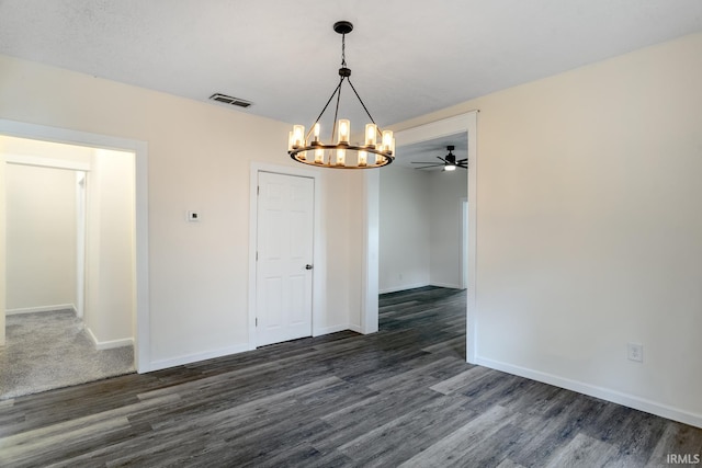 355 Blinn Ave, Frankfort, IN 46041 - empty room with a chandelier, dark wood-type flooring, baseboards, and a ceiling fan
