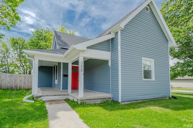 355 Blinn Ave, Frankfort, IN 46041 - view of front of home featuring covered porch and a shingled roof