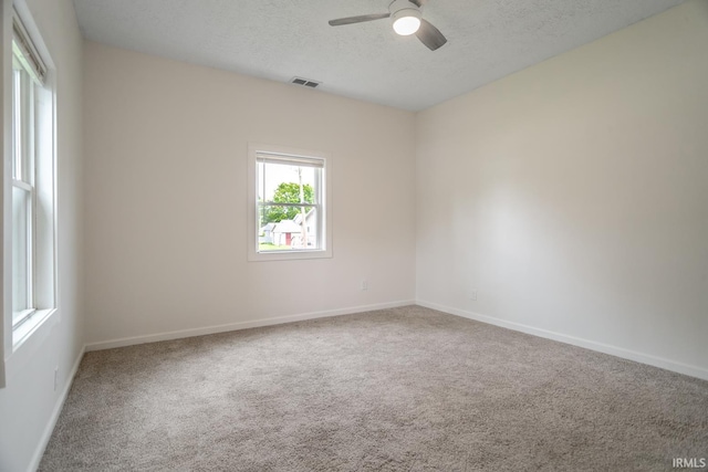 355 Blinn Ave, Frankfort, IN 46041 - carpeted empty room featuring ceiling fan, a textured ceiling, and baseboards