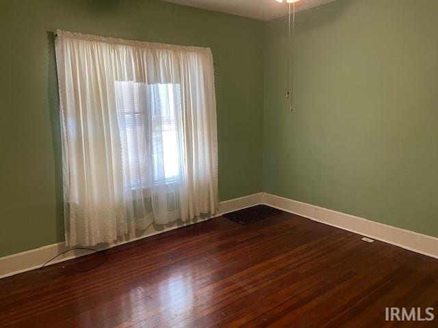 2725 Marion Ave, Evansville, IN 47712 - unfurnished room with baseboards and wood finished floors