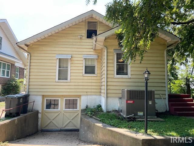 2725 Marion Ave, Evansville, IN 47712 - view of front of house featuring central air condition unit