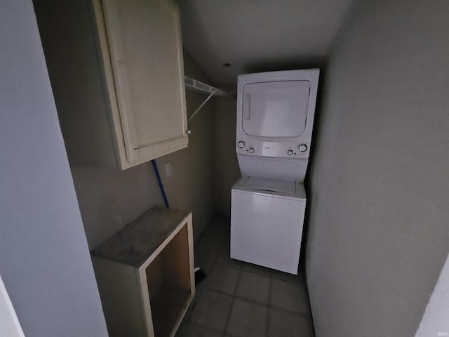 808 N 9th St, Vincennes, IN 47591 - laundry area featuring stacked washer / drying machine and tile patterned floors