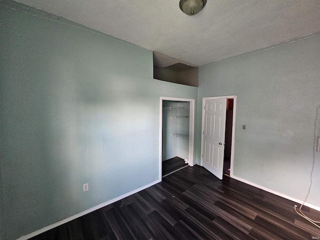 808 N 9th St, Vincennes, IN 47591 - unfurnished bedroom featuring dark wood finished floors, baseboards, and a closet