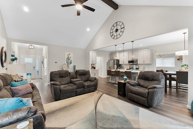 15332 Annabelle Pl, Leo, IN 46765 - living area with a ceiling fan, high vaulted ceiling, light wood finished floors, beam ceiling, and recessed lighting