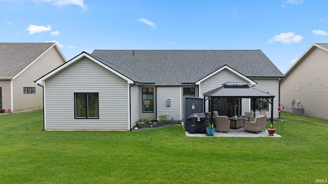 15332 Annabelle Pl, Leo, IN 46765 - back of property featuring an outdoor living space, a gazebo, a shingled roof, a patio area, and central AC