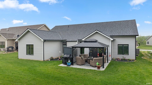 15332 Annabelle Pl, Leo, IN 46765 - rear view of house with an outdoor living space, a gazebo, a patio, a shingled roof, and a lawn