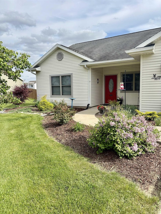 707 Hope Dr, Fremont, IN 46737 - ranch-style home featuring a front lawn and roof with shingles