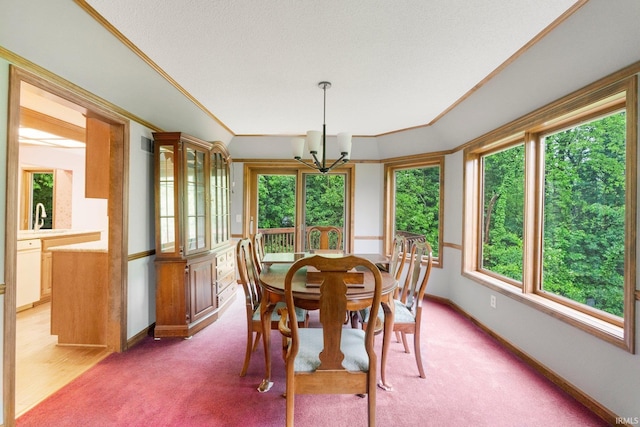 2711 Spring Creek Dr, Fort Wayne, IN 46808 - dining space with healthy amount of natural light, a chandelier, and baseboards