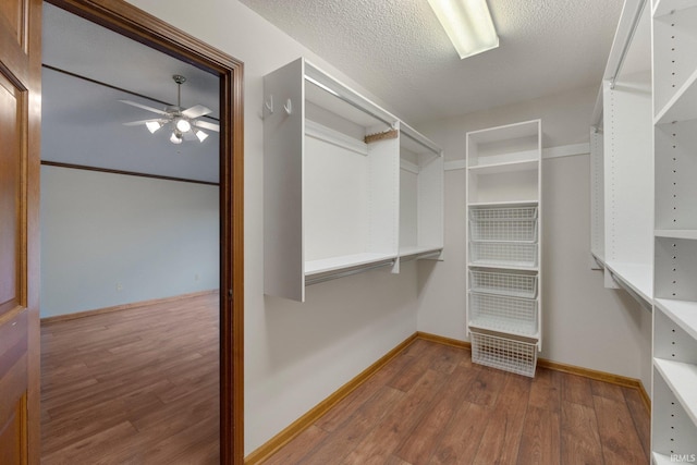2711 Spring Creek Dr, Fort Wayne, IN 46808 - spacious closet featuring ceiling fan and wood finished floors