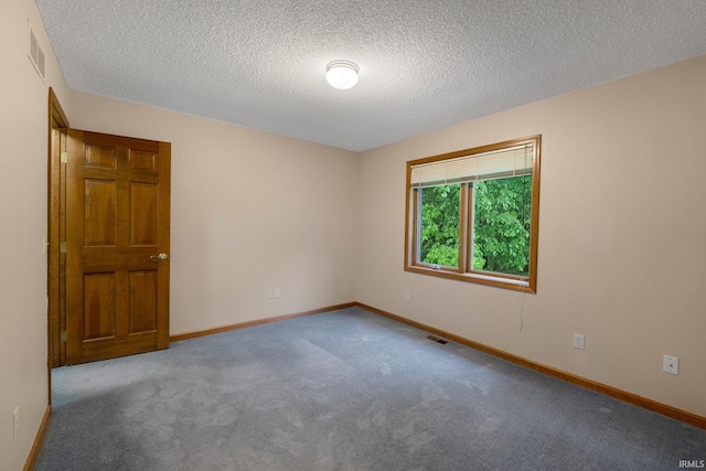 2711 Spring Creek Dr, Fort Wayne, IN 46808 - carpeted spare room featuring baseboards and a textured ceiling