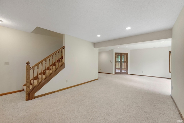 2711 Spring Creek Dr, Fort Wayne, IN 46808 - unfurnished living room with recessed lighting, carpet floors, stairs, and baseboards