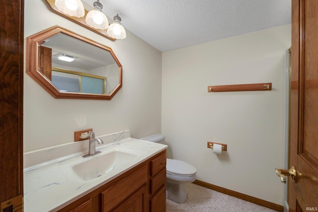 2711 Spring Creek Dr, Fort Wayne, IN 46808 - bathroom featuring toilet, vanity, a textured ceiling, and baseboards