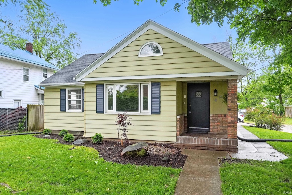 408 Burns Blvd, Fort Wayne, IN 46807 - bungalow-style home with roof with shingles