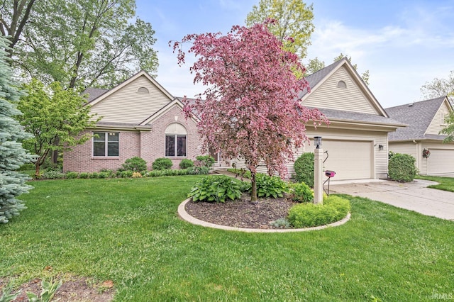 1224 Foxglove Ct, Mishawaka, IN 46545 - single story home featuring an attached garage, driveway, a front yard, and roof with shingles