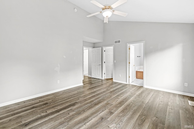 1224 Foxglove Ct, Mishawaka, IN 46545 - unfurnished bedroom with wood finished floors, baseboards, high vaulted ceiling, and ensuite bathroom