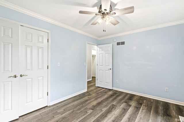 1224 Foxglove Ct, Mishawaka, IN 46545 - unfurnished bedroom with wood finished floors, baseboards, crown molding, a ceiling fan, and a closet