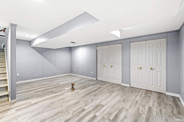 1224 Foxglove Ct, Mishawaka, IN 46545 - finished below grade area with stairs, baseboards, and wood finished floors