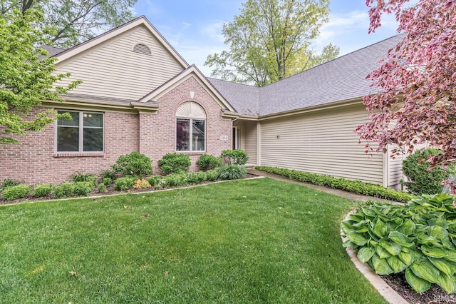 1224 Foxglove Ct, Mishawaka, IN 46545 - ranch-style house featuring a front yard, brick siding, and a shingled roof