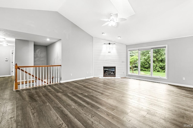 1224 Foxglove Ct, Mishawaka, IN 46545 - unfurnished living room featuring lofted ceiling, wood-type flooring, a ceiling fan, a fireplace, and baseboards