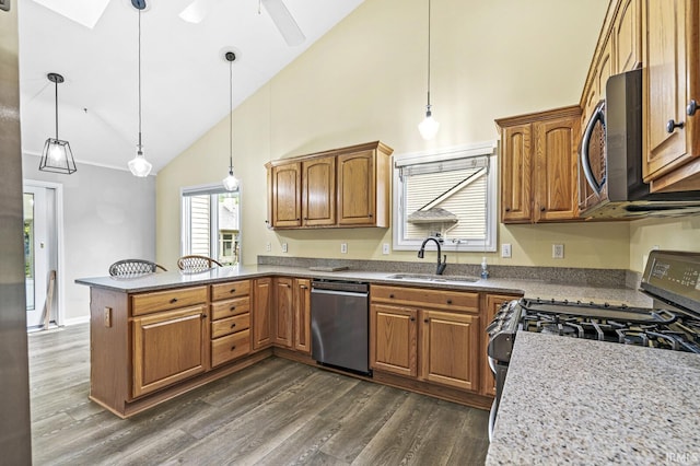 1224 Foxglove Ct, Mishawaka, IN 46545 - kitchen with appliances with stainless steel finishes, a sink, high vaulted ceiling, dark wood-style flooring, and brown cabinetry