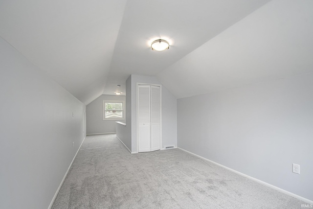 4113 York Rd, South Bend, IN 46614 - additional living space with carpet flooring, lofted ceiling, and baseboards