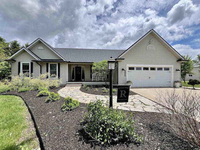 65600 Ash Rd, Wakarusa, IN 46573 - ranch-style home with driveway, a garage, and covered porch