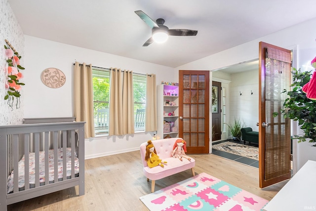 65600 Ash Rd, Wakarusa, IN 46573 - bedroom featuring french doors, wood finished floors, ceiling fan, and baseboards