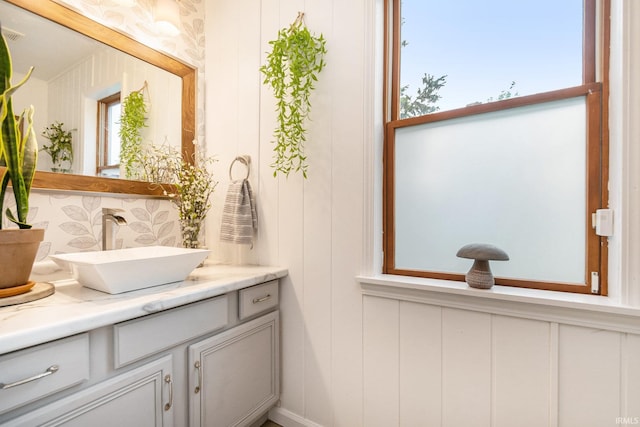 65600 Ash Rd, Wakarusa, IN 46573 - bathroom with vanity and wallpapered walls