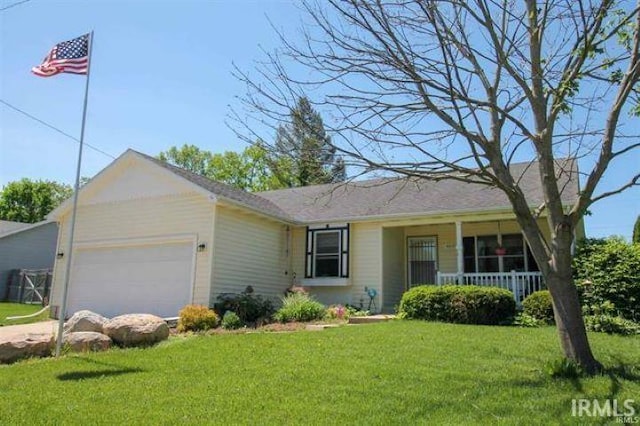 4019 Riverside Dr, South Bend, IN 46628 - ranch-style house with an attached garage, a front yard, and covered porch