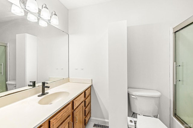 4019 Riverside Dr, South Bend, IN 46628 - full bathroom with toilet, an enclosed shower, vanity, and baseboards