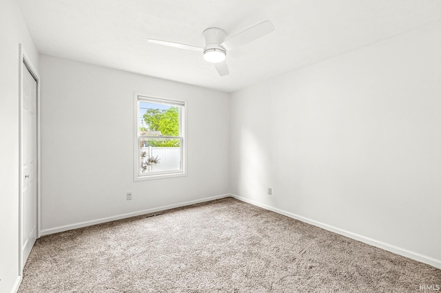 4019 Riverside Dr, South Bend, IN 46628 - carpeted empty room with ceiling fan and baseboards