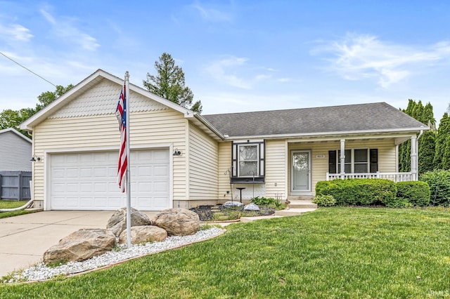 4019 Riverside Dr, South Bend, IN 46628 - view of front facade featuring driveway, a front lawn, a garage, and covered porch