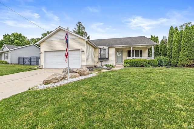4019 Riverside Dr, South Bend, IN 46628 - view of front of home featuring concrete driveway, a garage, a porch, and a front lawn